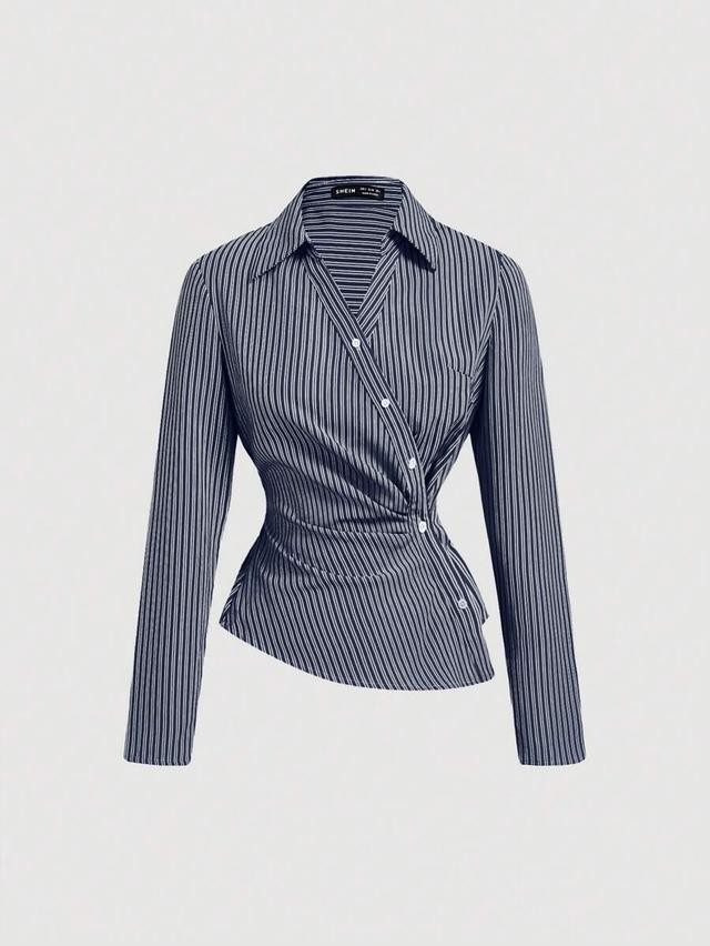 navy and white striped wrap-style long sleeve blouse
