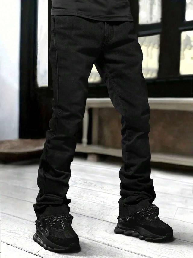 black versatile skinny jeans with stacked hem