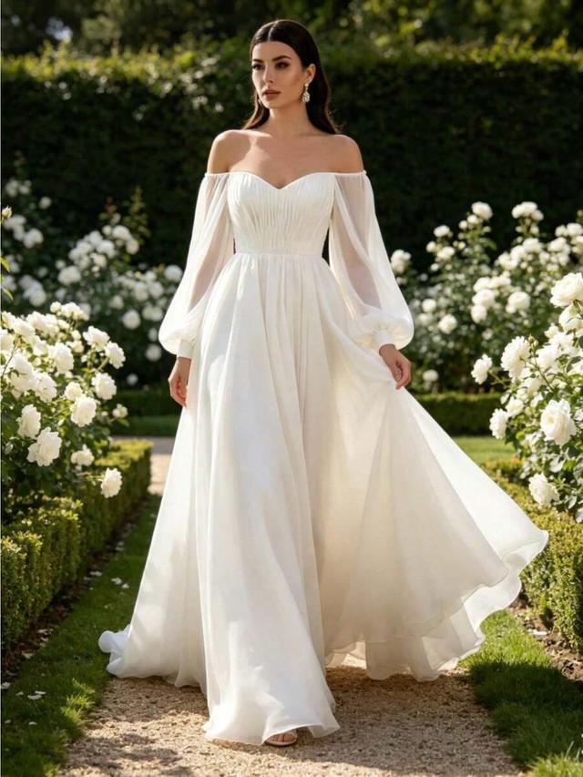 white off-shoulder chiffon gown with pleated bodice