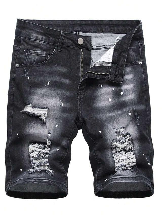 black ripped frayed denim shorts with splash ink print