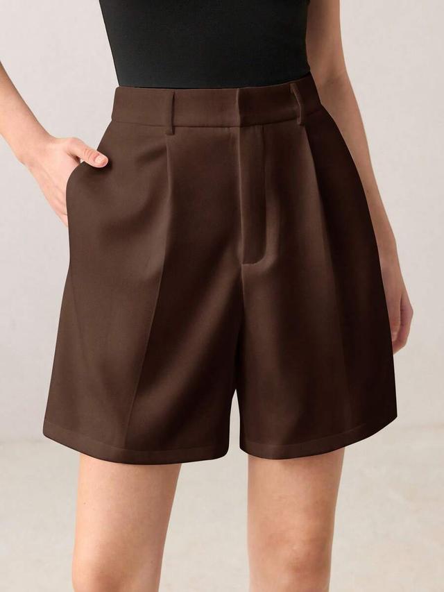 tailored brown high-waisted pleated shorts