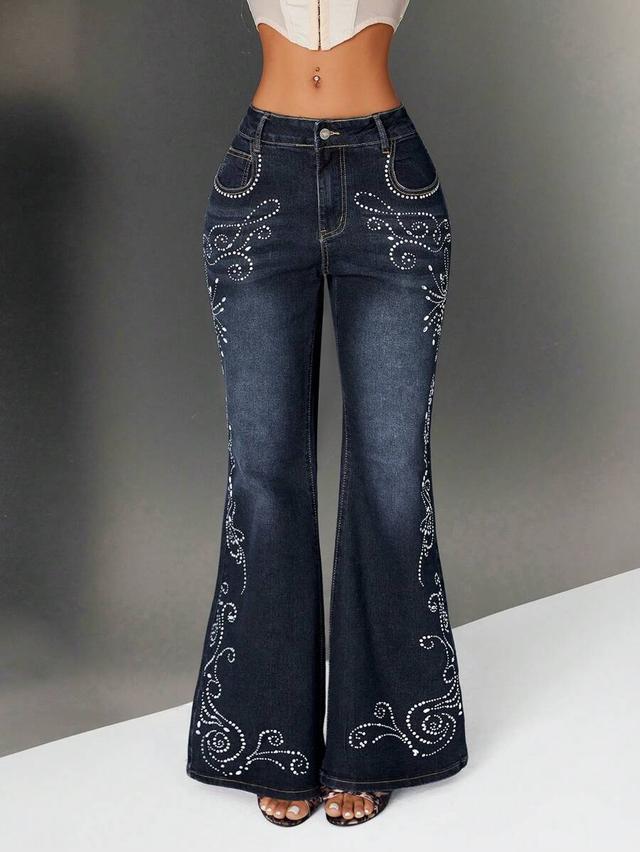 dark wash denim flare jeans with rhinestone embellishment
