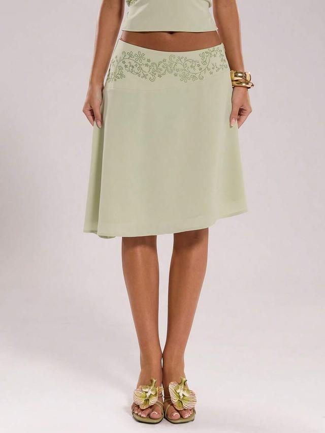 sage green rhinestone embellished asymmetric hem skirt