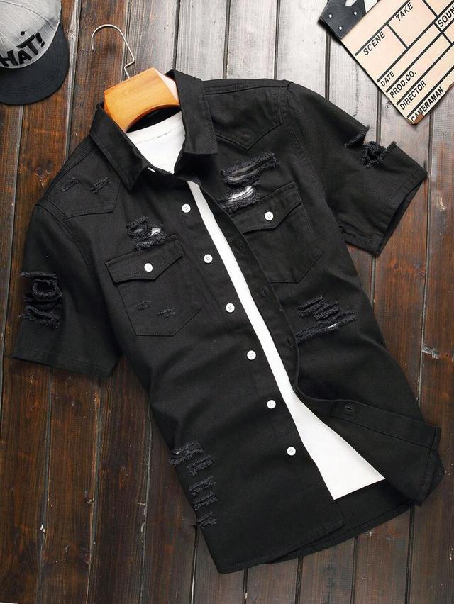 black ripped denim short sleeve shirt with flap pockets