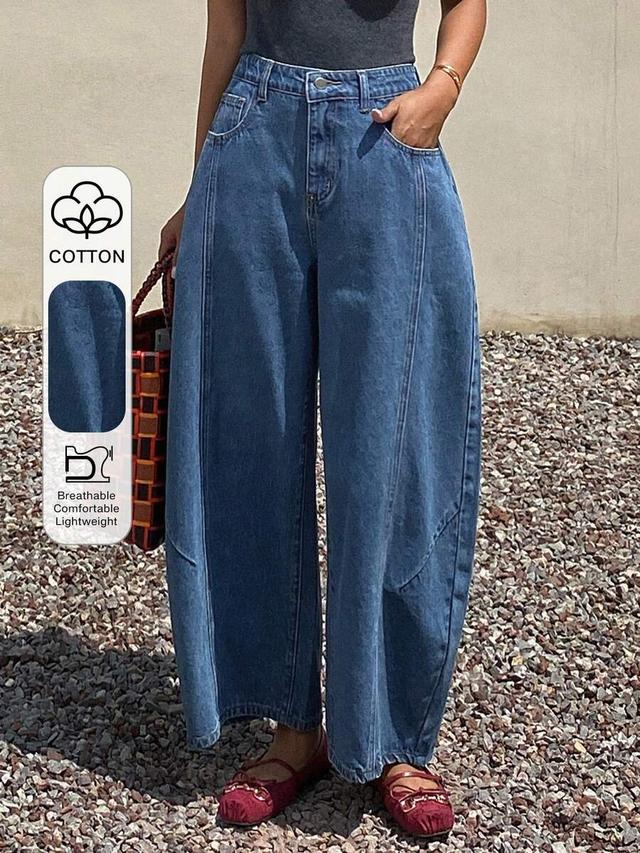solid blue loose curved leg denim trousers
