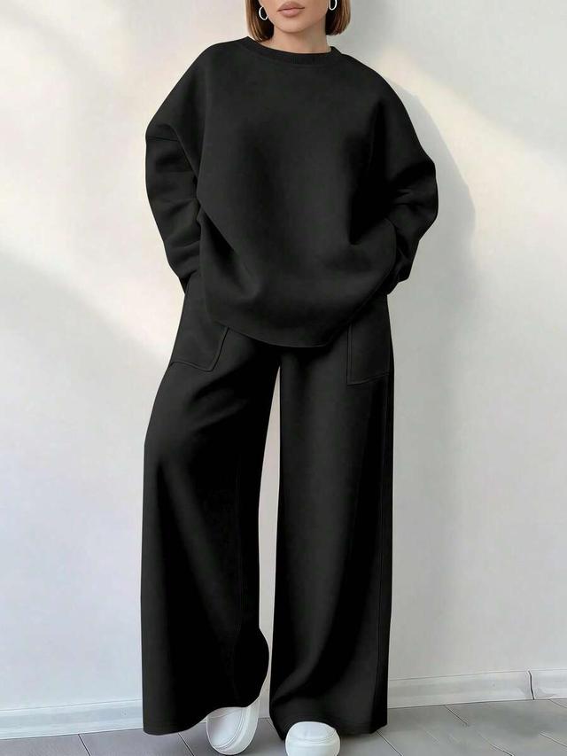 casual solid black drop shoulder sweatshirt and wide leg pants set