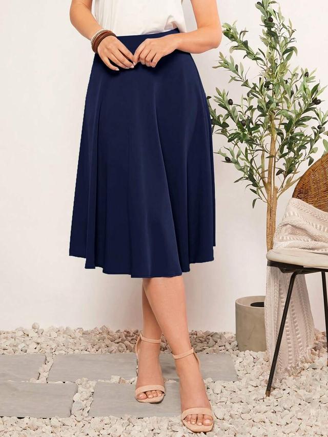 solid navy high waist flared midi skirt