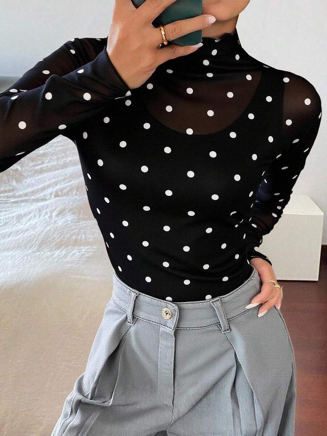 polka dot sheer long sleeve mock neck blouse