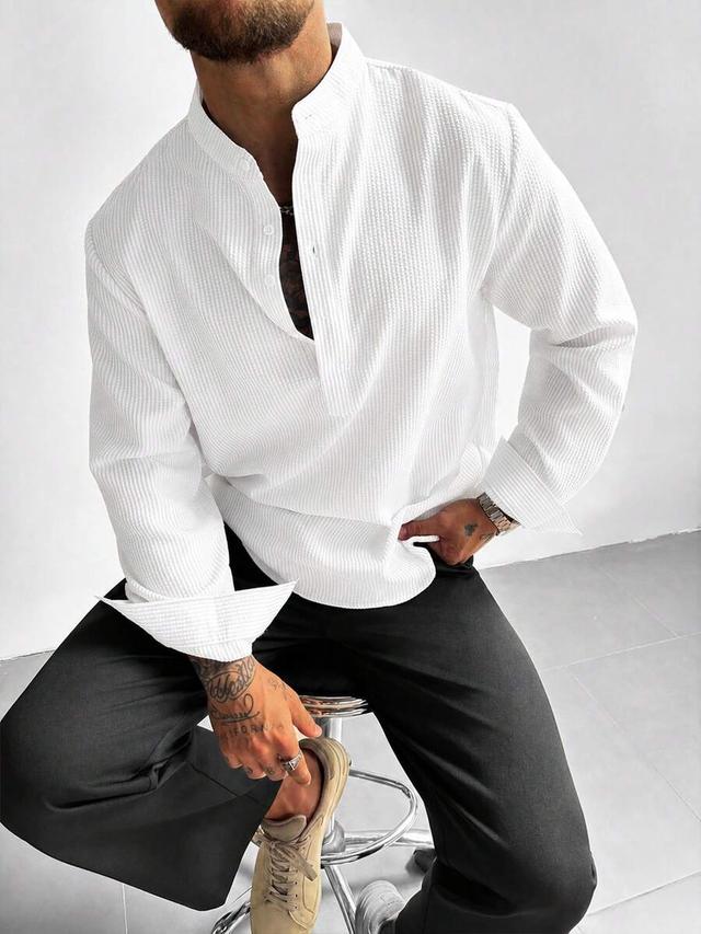 white textured half-placket stand collar long sleeve shirt