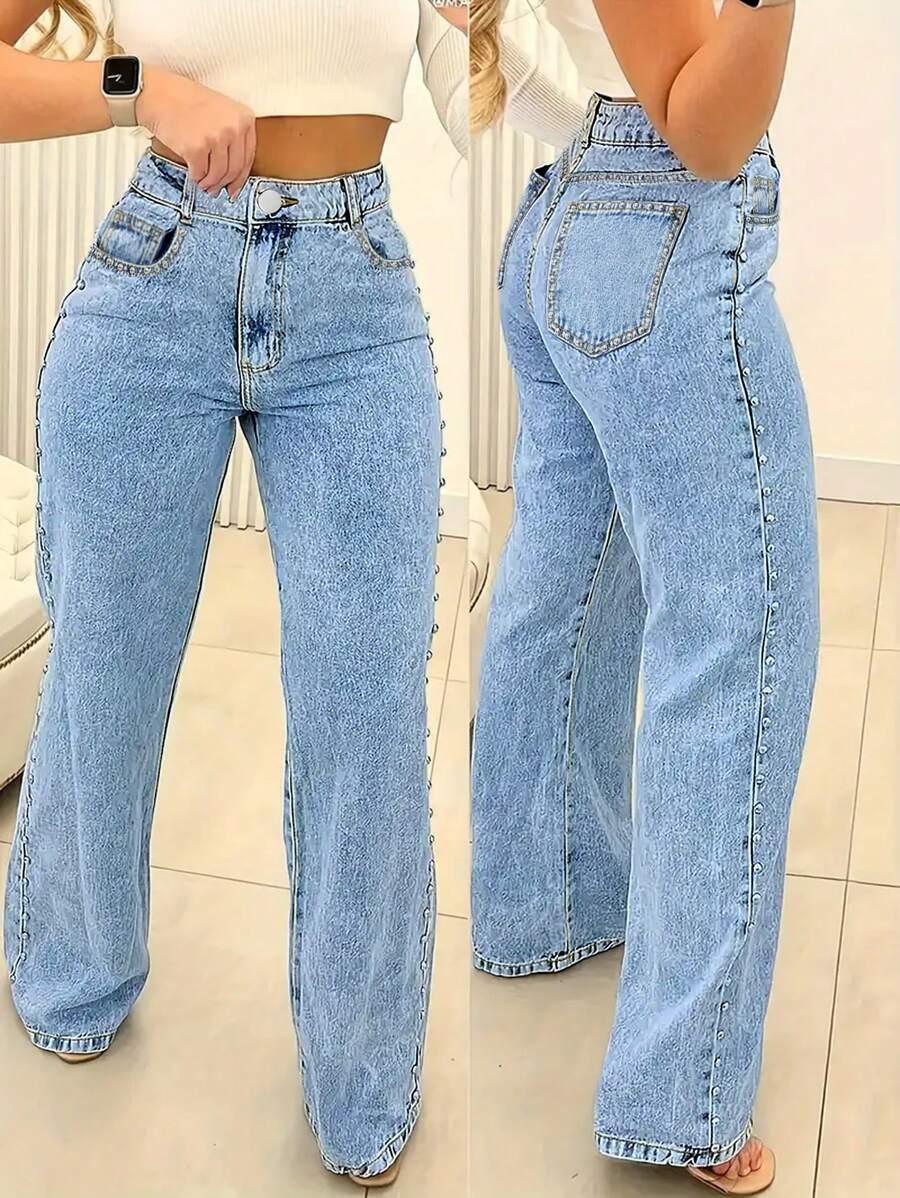 light wash denim wide leg jeans with side studs