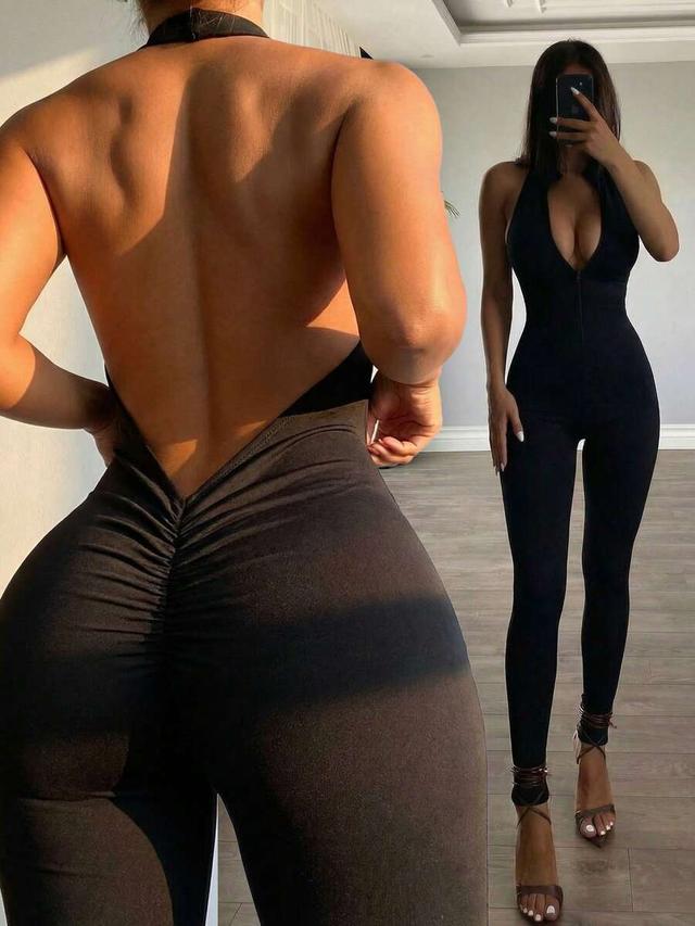 black backless halter jumpsuit with ruched detailing