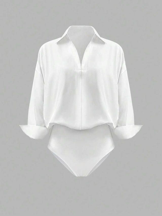 minimalist white long sleeve shirt bodysuit