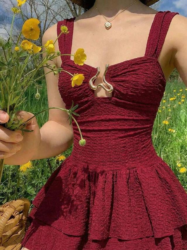 dark red textured mini dress with metal accent