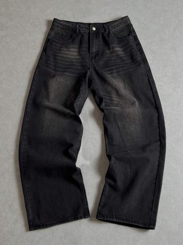 distressed black solid color denim jeans