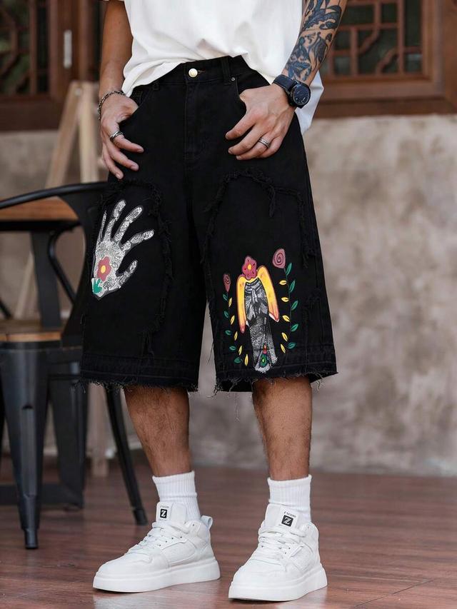 black denim shorts with graphic palm print