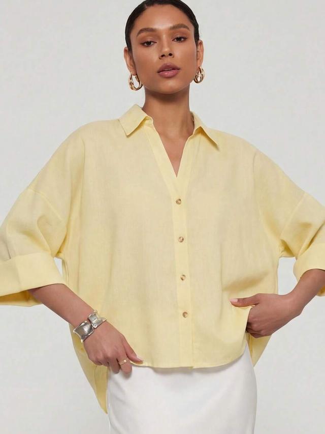 simple yellow collared shirt with wide sleeves