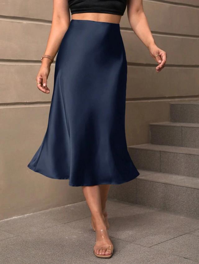 navy blue satin mid-length bias cut skirt