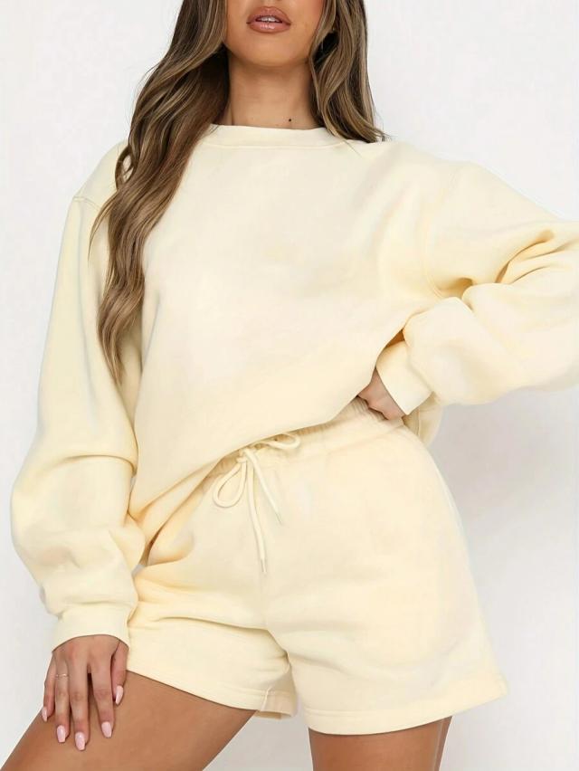 pale yellow cotton sweatshirt and drawstring waist shorts