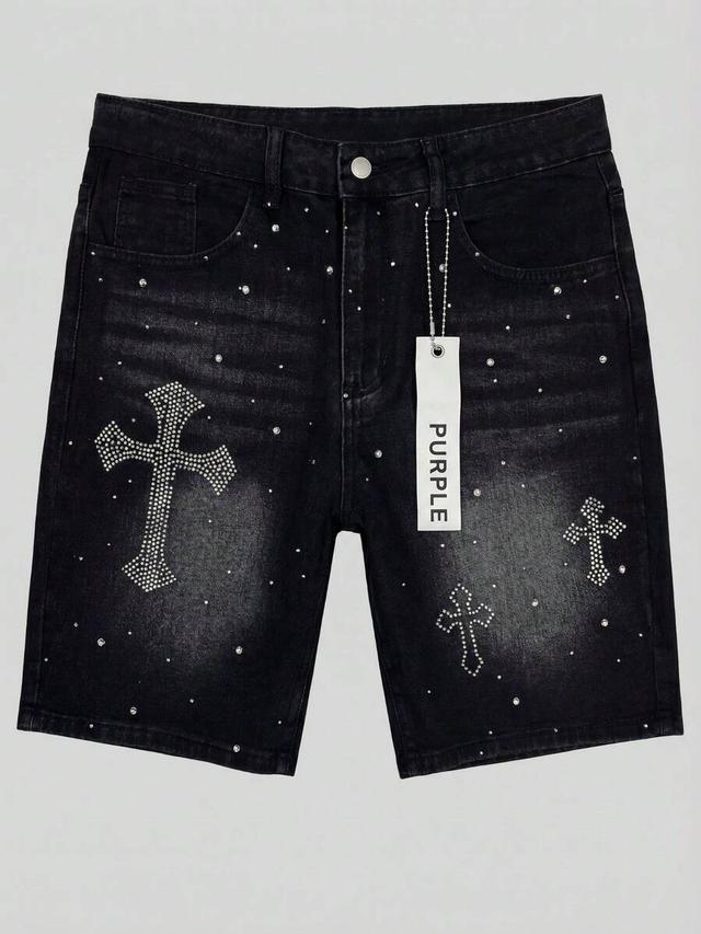black denim shorts with rhinestone cross embellishments