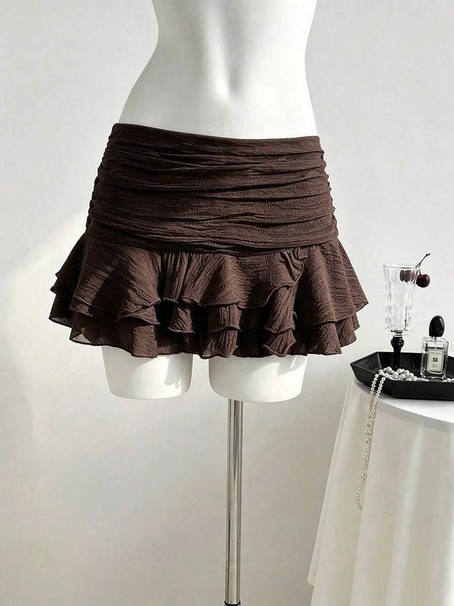 brown ruched mini skirt with ruffled hem