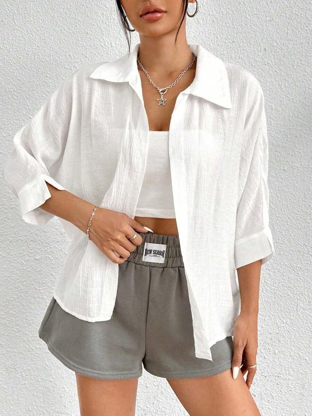 white solid textured batwing sleeve button up shirt
