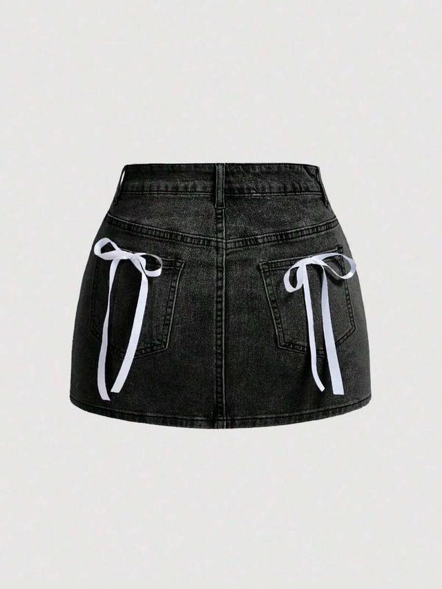 black denim mini skirt with white bow ties