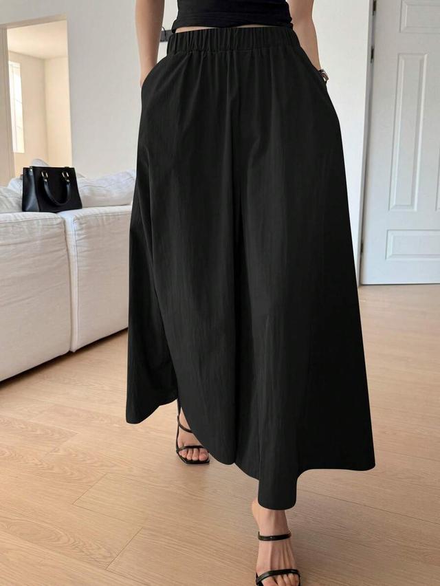 elegant black solid color loose wide leg trousers