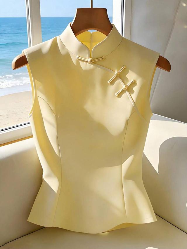 pale yellow sleeveless qipao style stand collar blouse