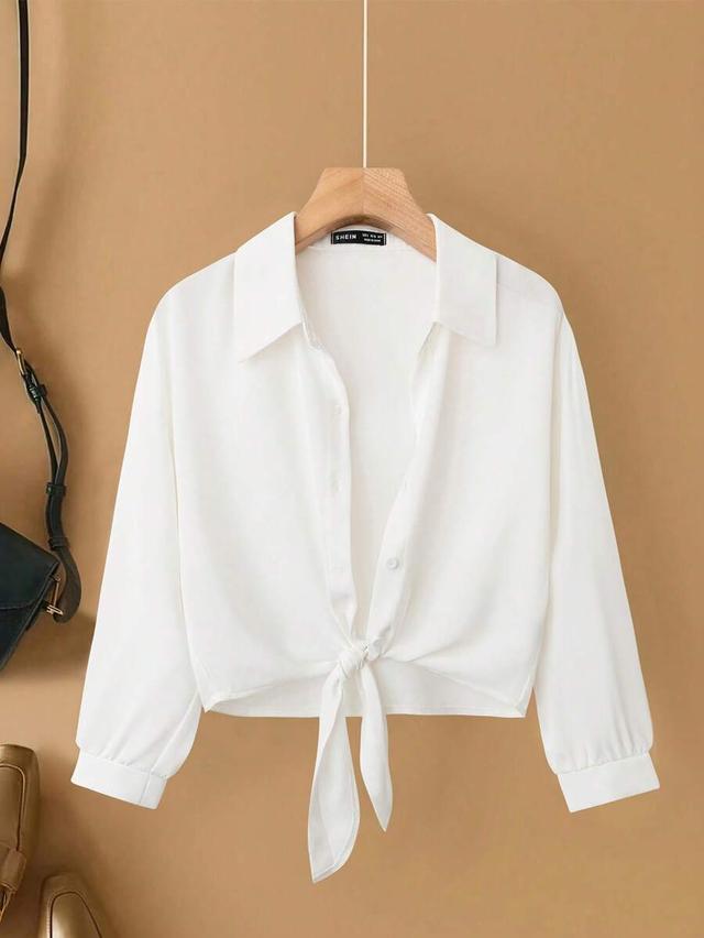 white long sleeve tie-hem button-up blouse