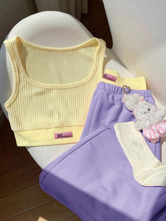 purple ribbed camisole and contrast purple pants set