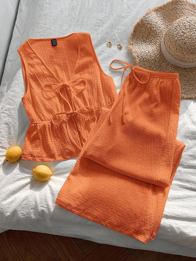 orange textured knit tie front camisole and pants set
