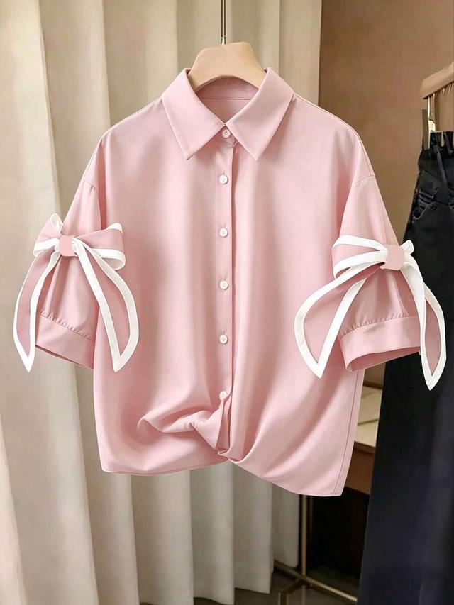 pink loose fit blouse with contrast bowknot sleeves