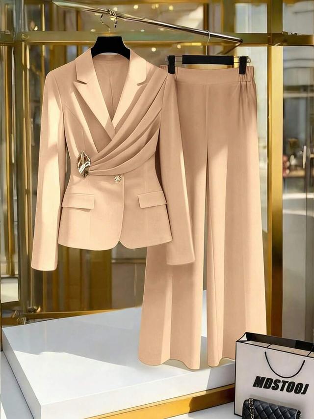 elegant beige waist cinched blazer with decorative button