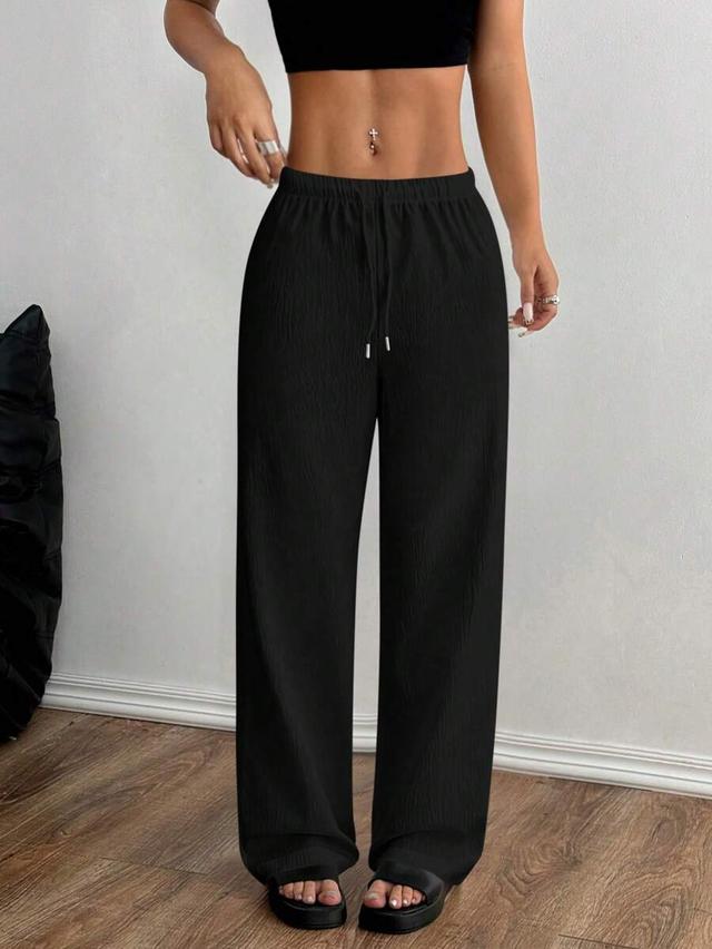 black textured front tie minimalist casual trousers
