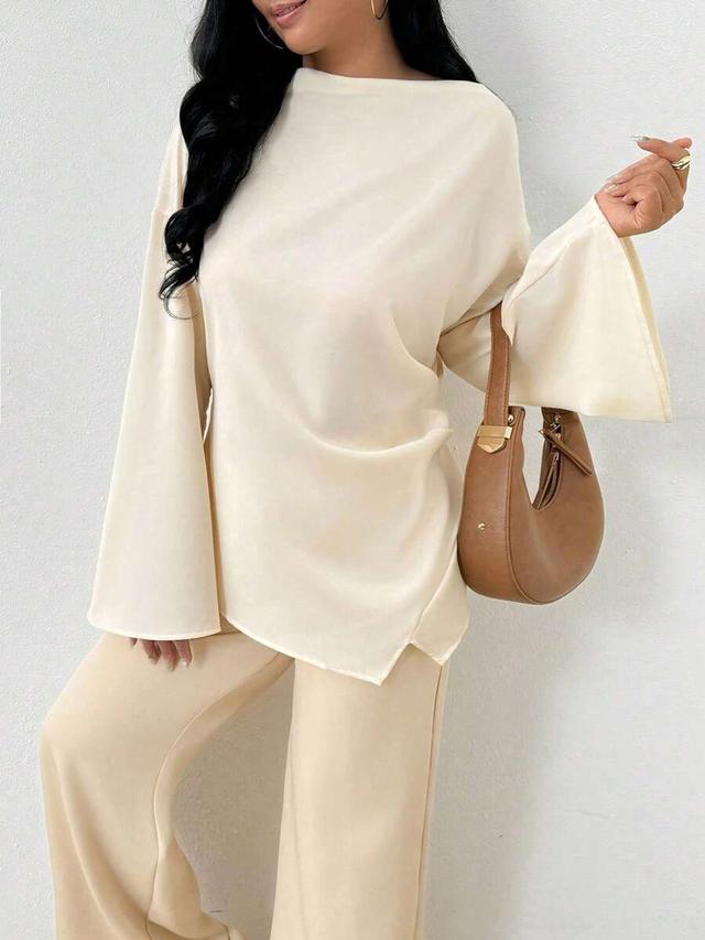 elegant cream bell sleeve blouse