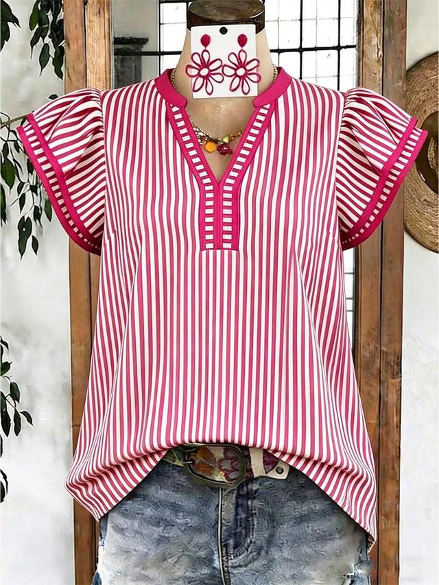 striped v-neck blouse with contrast trim and puff sleeves