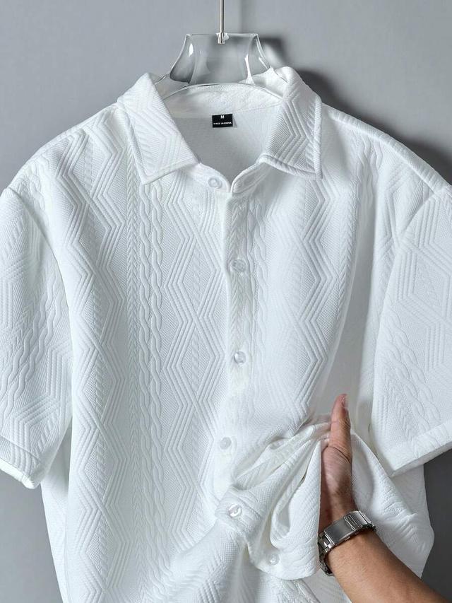 white textured short sleeve button up shirt