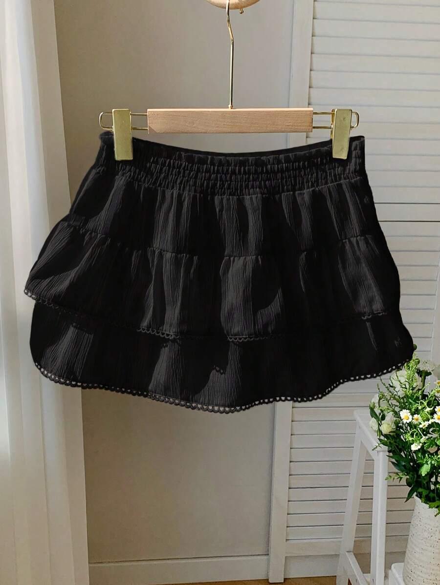 black tiered ruffle mini skirt with lace trim