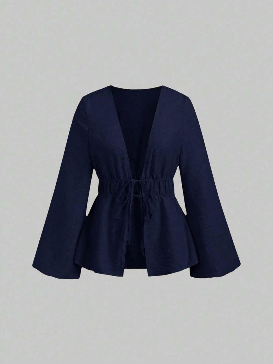 navy blue long sleeve lace-up peplum top