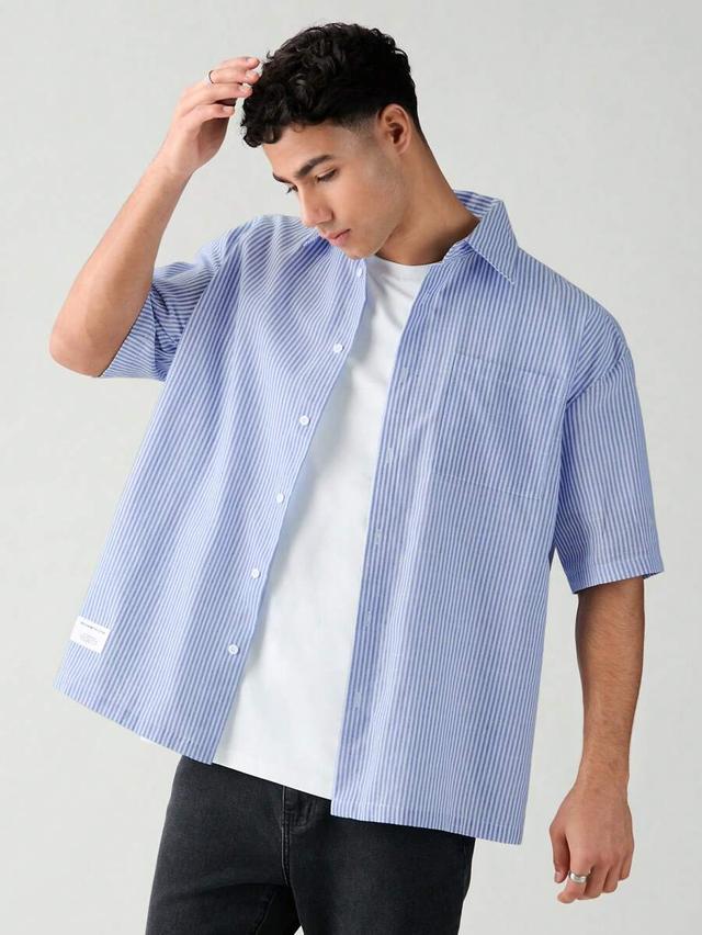 men's blue striped woven short sleeve shirt