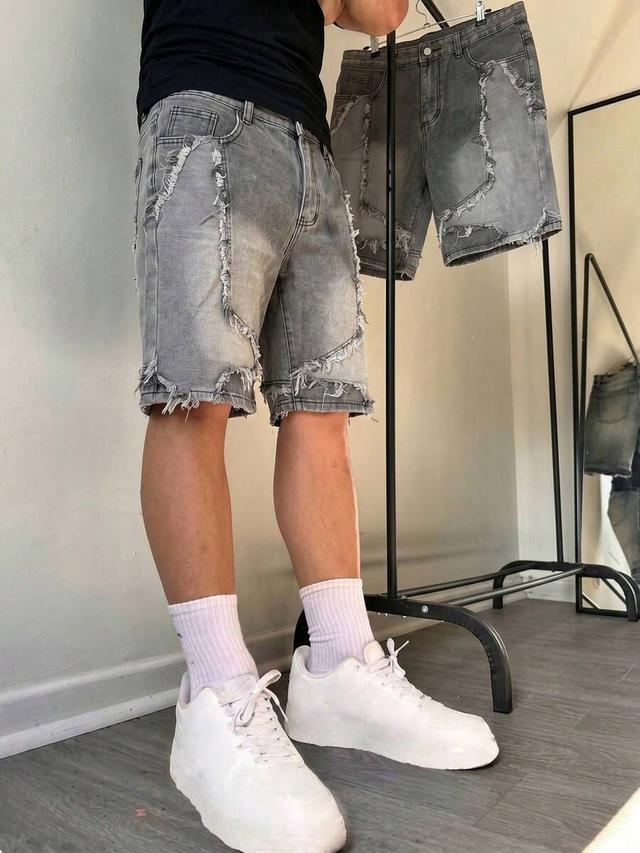 distressed grey denim baggy mid-length shorts