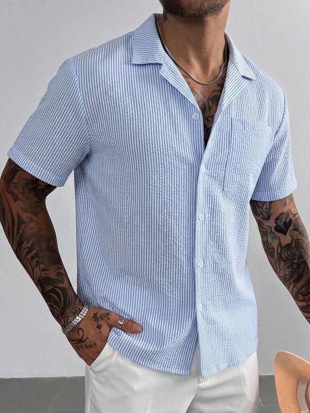 blue and white striped textured short sleeve shirt
