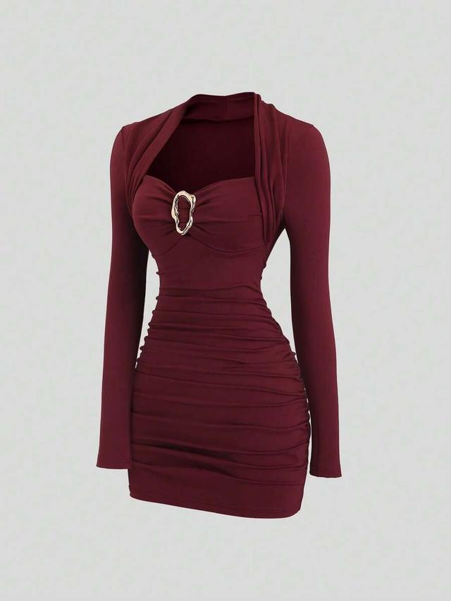 burgundy fitted cocktail dress with metal decor