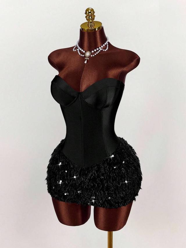 black bustier mini dress with faux fur hem
