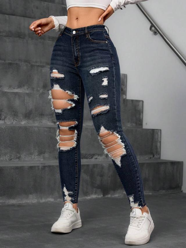 dark wash distressed skinny denim jeans