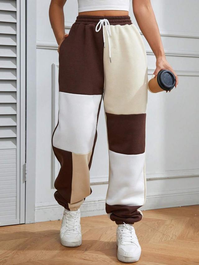 light beige colorblock drawstring waist slant pocket sweatpants