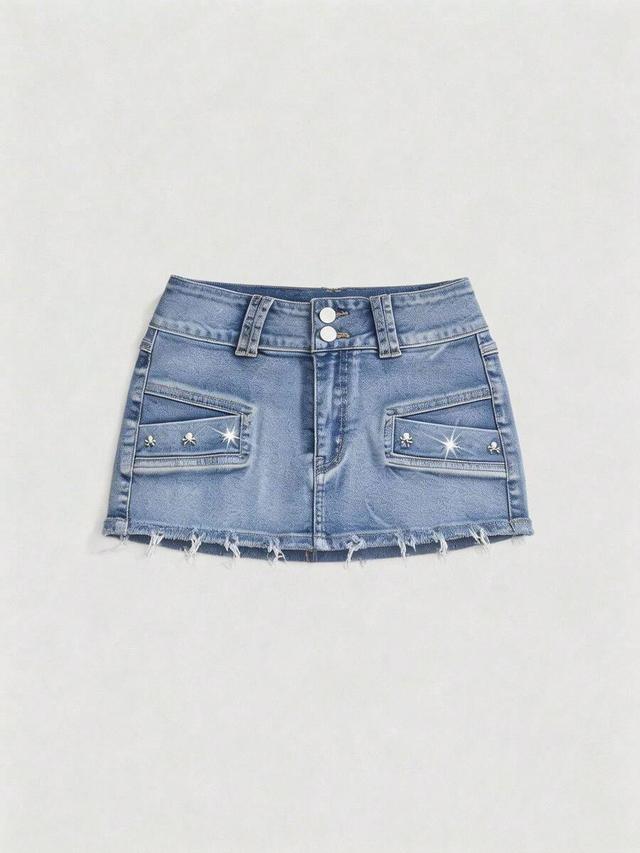 distressed denim mini skirt with skull studs