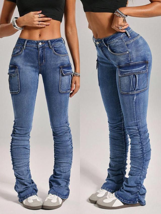 blue distressed stacked cargo jeans with slant pockets
