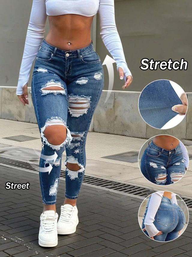 distressed blue denim skinny jeans