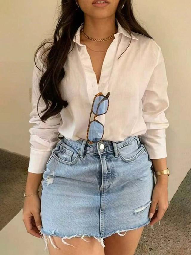 light-colored distressed denim mini skirt